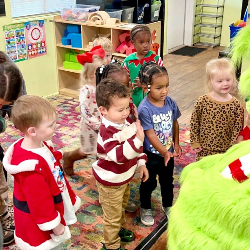 Children playing with blocks at Red Trolleys Daycare in Valdosta, GA, enjoying nurturing childcare and preschool programs.