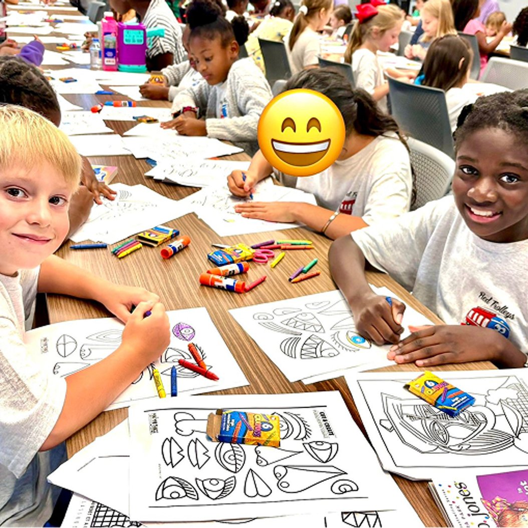 Pre-K children in Valdosta engaging in a fun classroom activity, building early academic skills and confidence.
