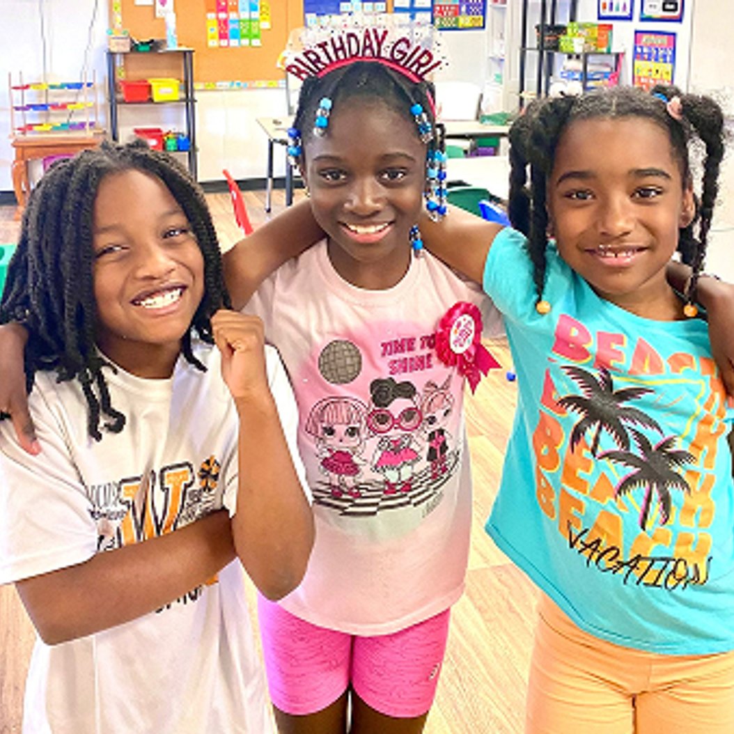 Pre-K children in Valdosta engaging in a fun classroom activity, building early academic skills and confidence.