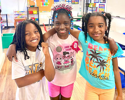Happy kids at Red Trolleys Daycare in Valdosta, GA attending preschool program.
