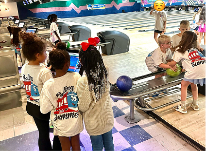 Children from Red Trolleys Daycare enjoying a bowling trip in Valdosta, GA.